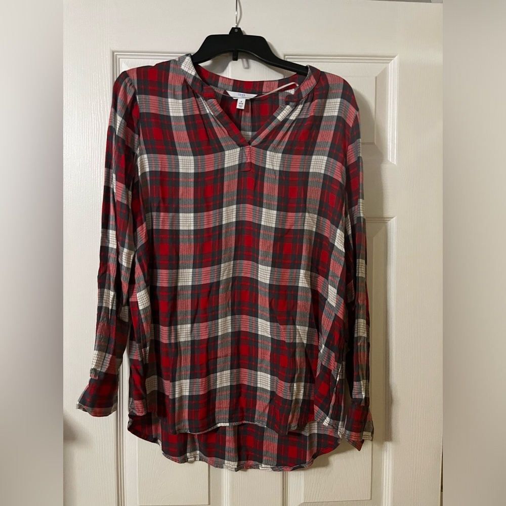 Women’s long sleeve dress top.